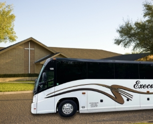 Coach bus in front of a church